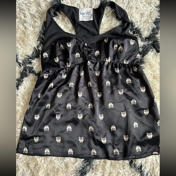 A shirt bundle with 5 tops (sizes include 1- XS, 3- smalls, and 1- medium) - Picture 2 of 11